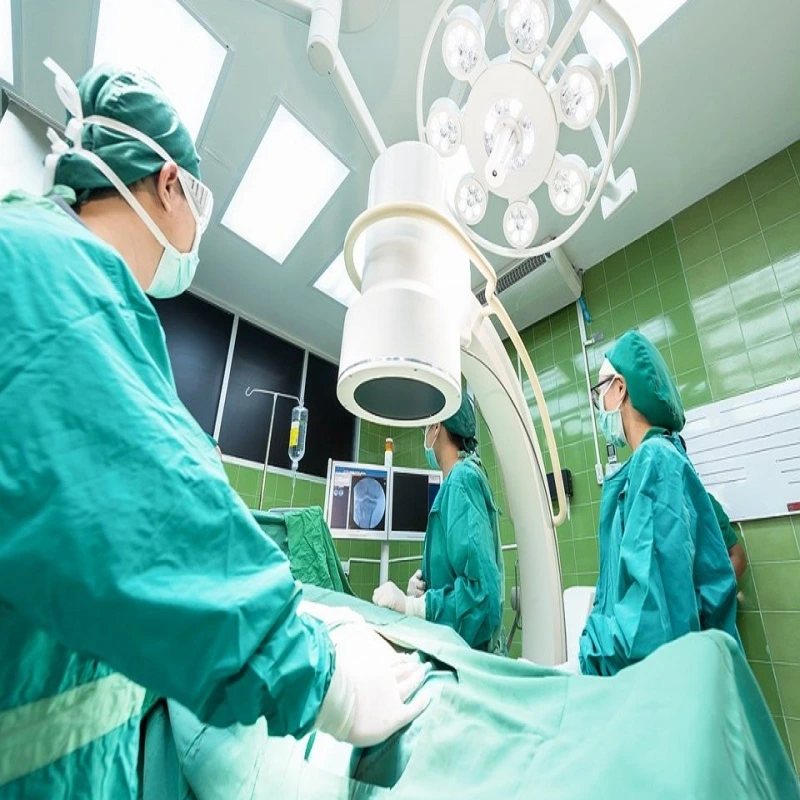 Image showing a group of students participating in clinical work experience, observing medical professionals and engaging in hands-on learning activities